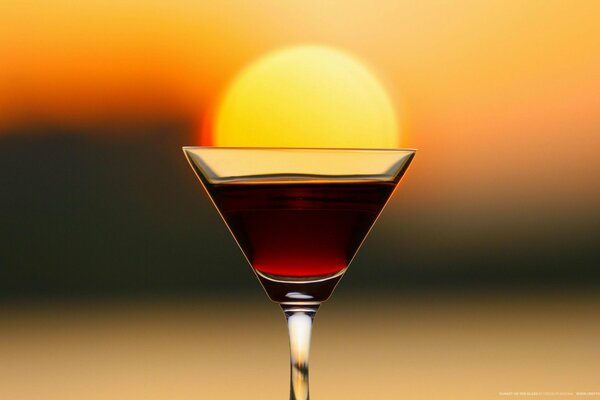 Sunset in a glass with a red drink