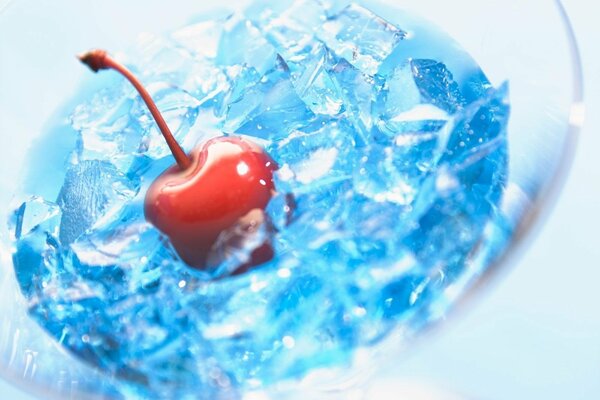 Red cherry frozen in ice