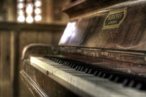 Faded keys of an old piano