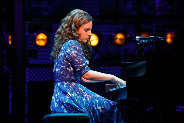 A pianist at the piano at a music show