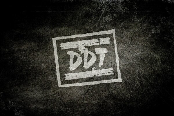 White DDT logo on black background