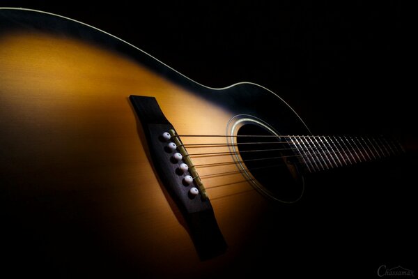 Guitar, macro in dark colors