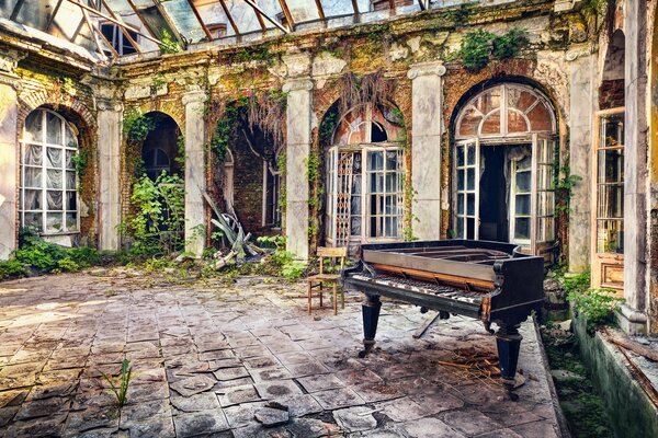 An old piano in an abandoned building