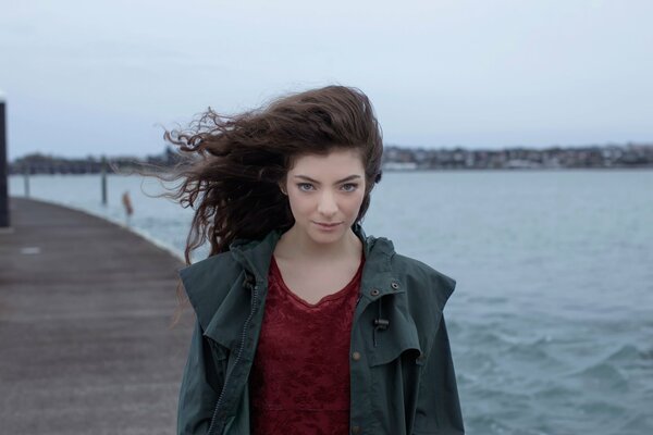 Beautiful girl on the background of the sea