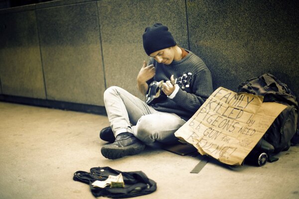 Ragazzo che suona l Ukulele