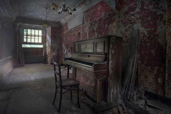 An old piano in an abandoned house