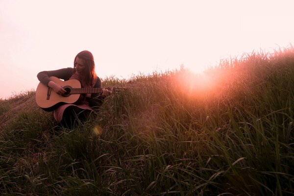 Cute girl playing guitar