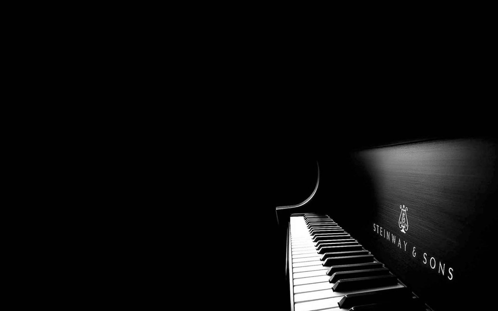 piano à queue noir et blanc touches