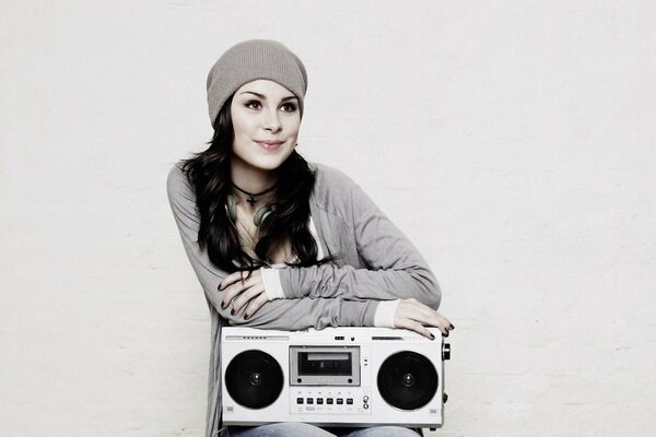 Brunette girl with a boombox