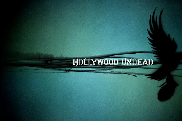 Un album du groupe hollywood undead: une colombe portant une Grenade