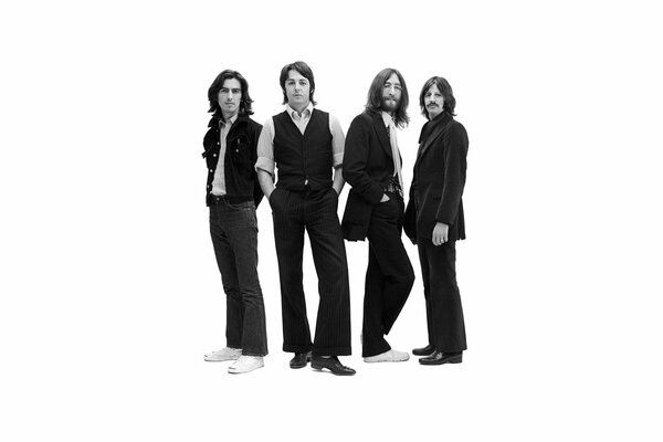 Beatles performers on a white background