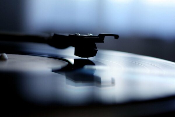 Wallpaper with a vinyl record and a record player