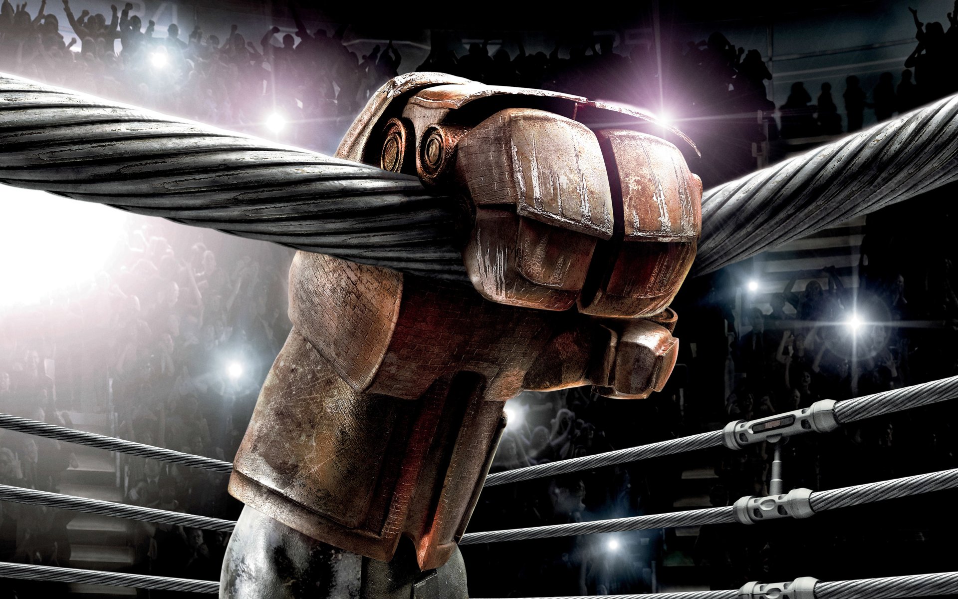 acero en vivo acero real ficción sala espectadores aficionados gradas ring cuerdas boxeo robot mano guante