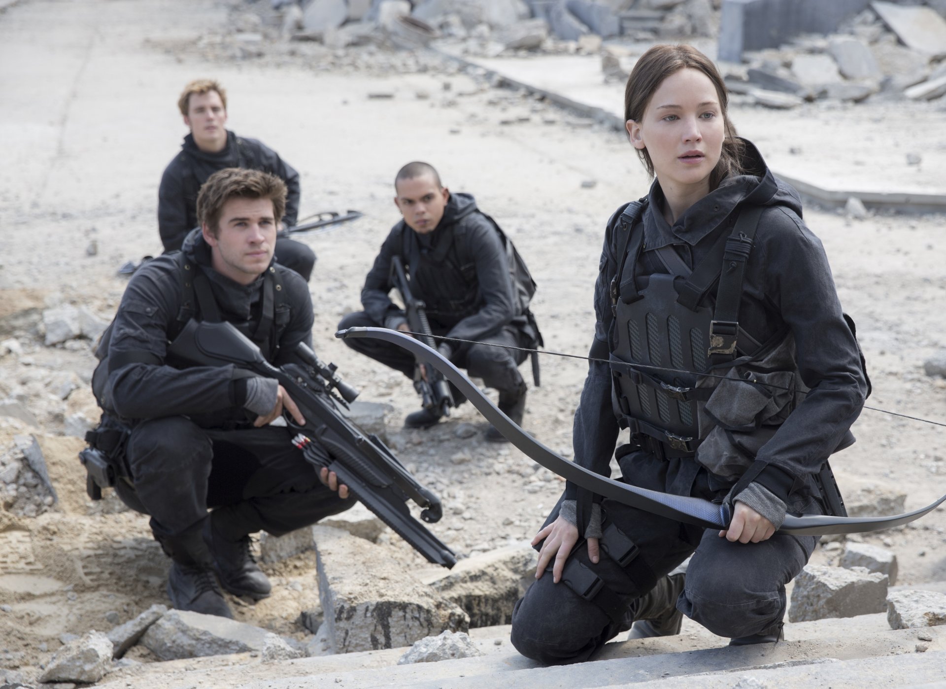 The Hunger Games: Mockingjay. Part II The Hunger Games : Mockingjay-Part 2 Jennifer Lawrence Liam Hemsworth Liam Hemsworth weapons equipment bow