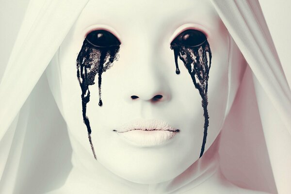 American Horror Story. A white nun with black eyes