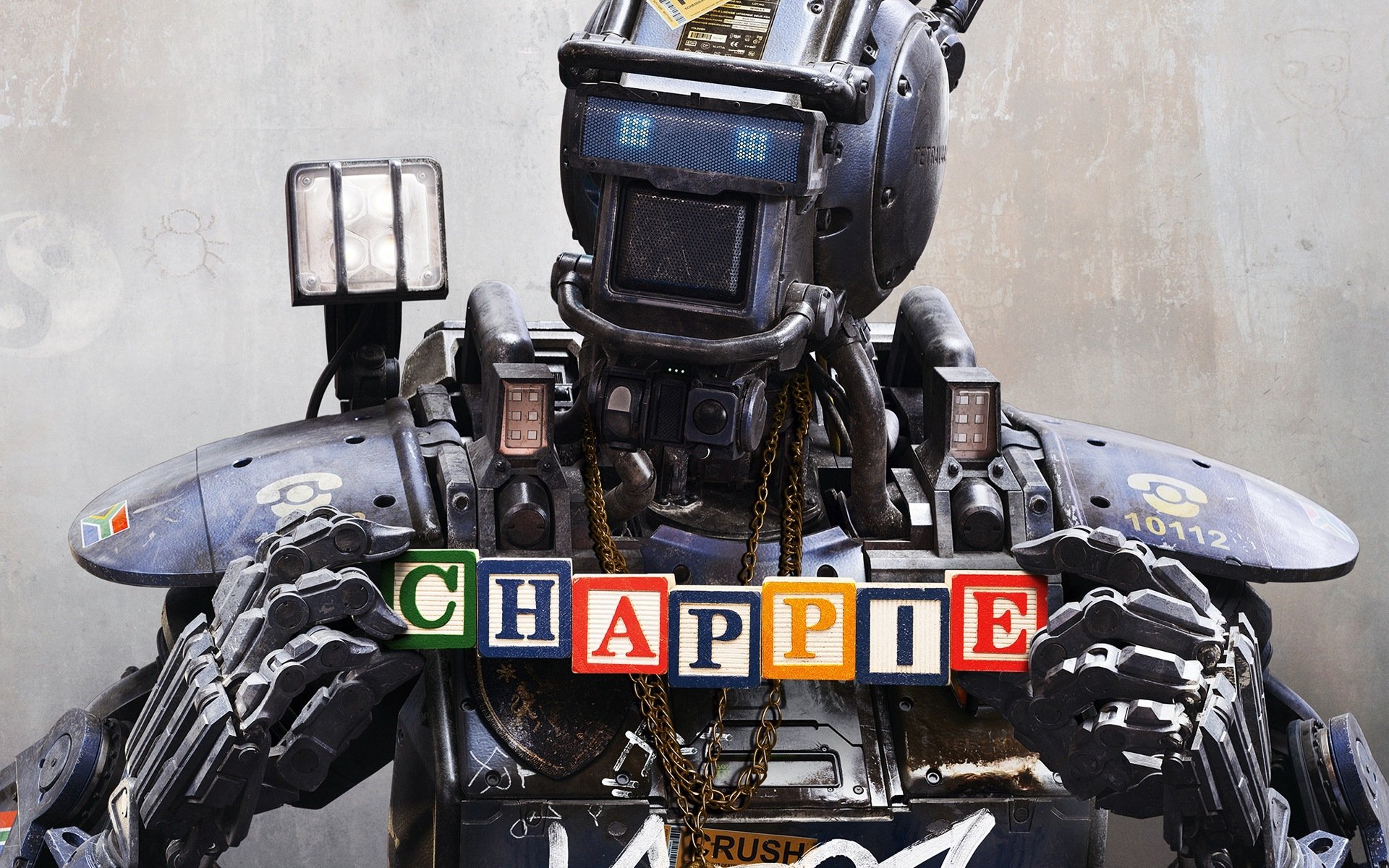 chappie kid robot movie robot named chappie cube