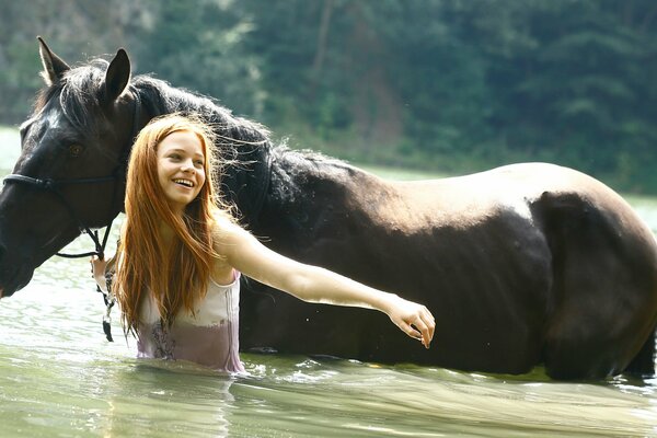 East wind. A girl with a horse