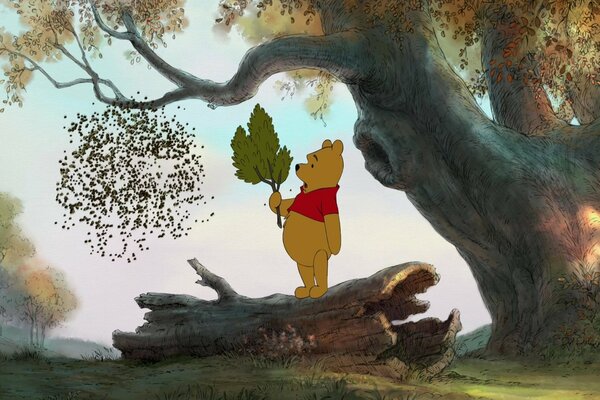 Winnie l ourson avec une branche contre les abeilles