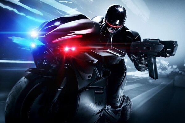 Robocop riding with a gun on a motorcycle