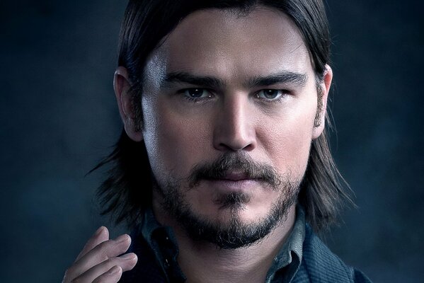 Actor Josh Harnett on a black background