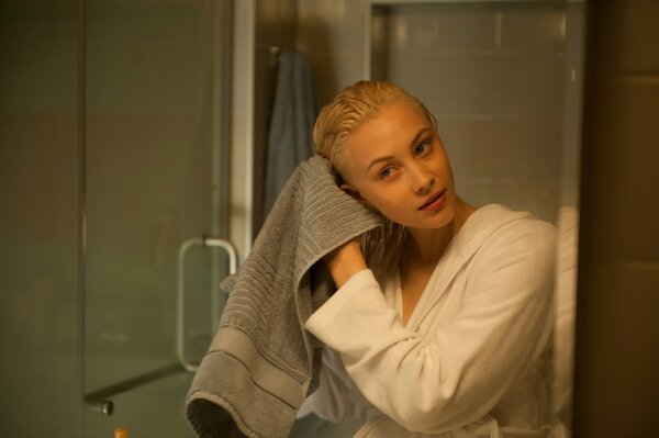 A girl with a towel in her hands