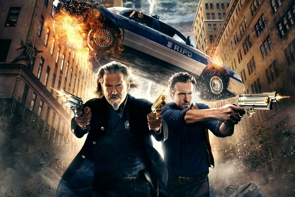 Ryan Reynolds e Jeff Bridges in armi