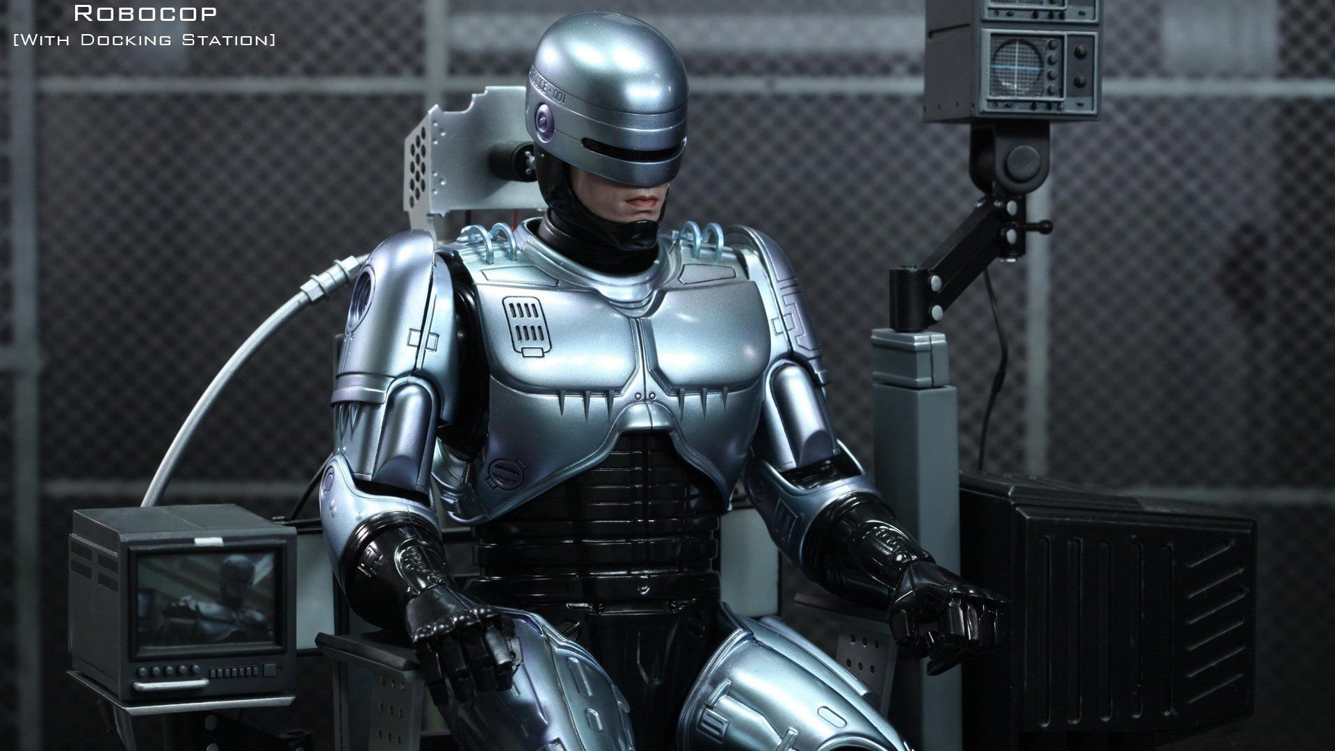 robocop hero cyborg robots police iron armour sitting charging