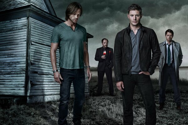 The image of the actors from the Supernatural series against the background of the river and the night sky