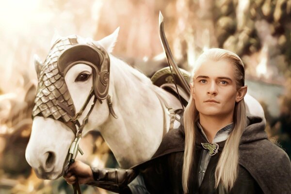 Legolas sostiene un caballo blanco