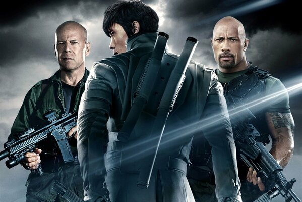 Dwayne Johnson bruce Willis with machine guns