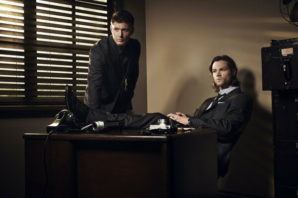 The supernatural. The Winchester brothers in the office