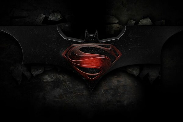 Superman-Logo auf dem schwarzen Batman-Logo