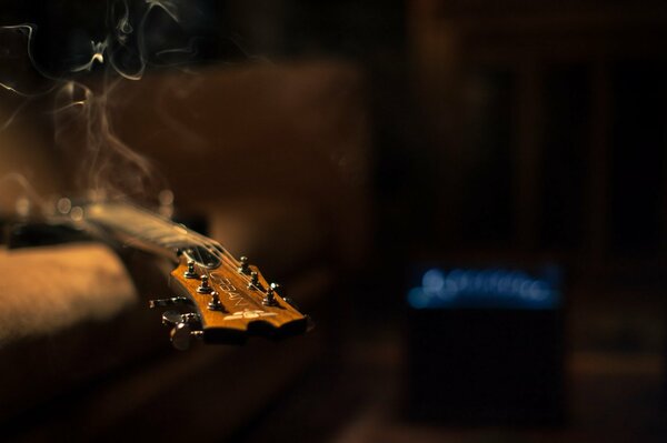 Guitar and cigarette smoke