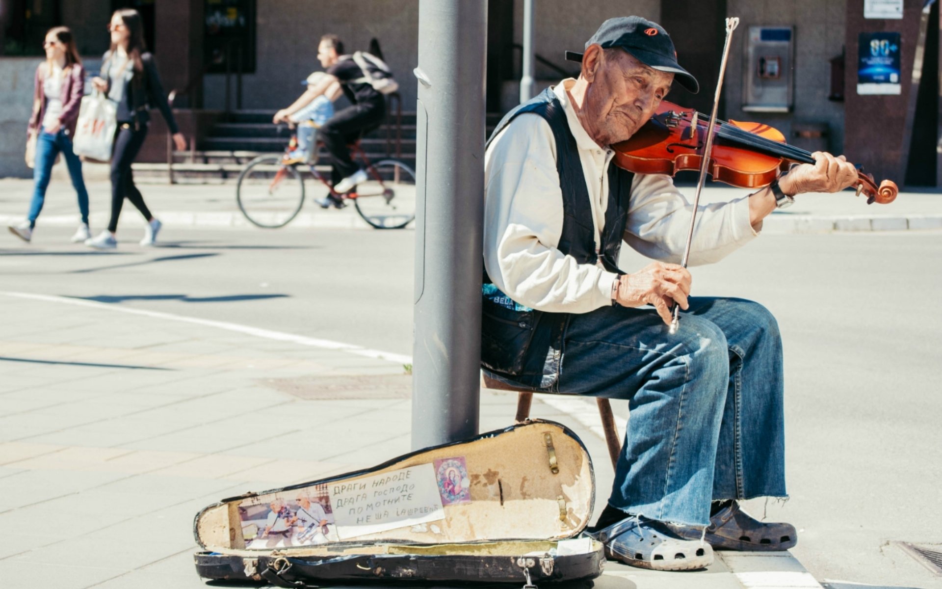 man violin street