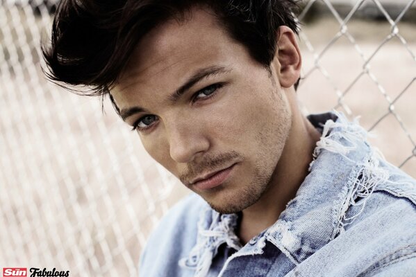 Foto del músico Tomlinson de la banda One direction