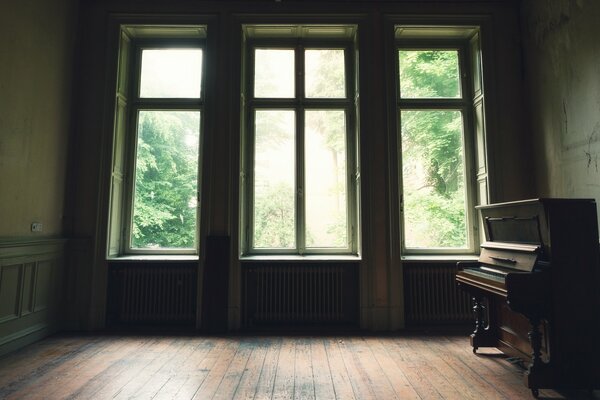 Piano in an empty dance hall