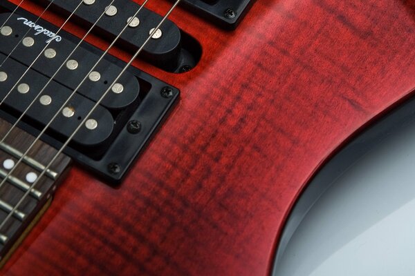 Photo macro d une guitare rouge