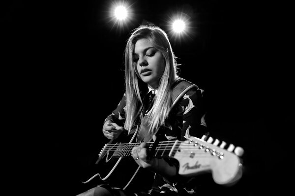 Famous singer louane emera plays guitar in France