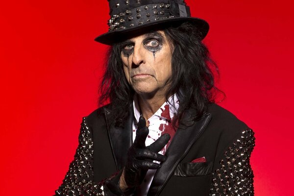 Alice Cooper on a red background