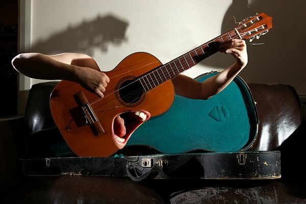 Foto-montaggio di una chitarra che canta che suona da sola