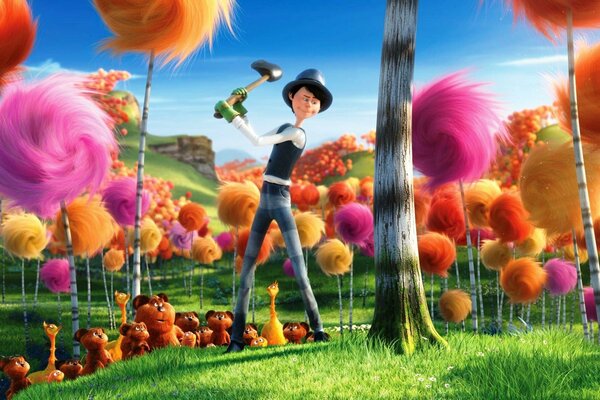 Denis de Vito coupe des arbres moelleux sur la pelouse du Lorax