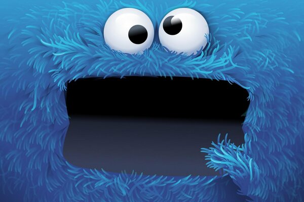 Surprised fluffy blue cookie monster with open mouth