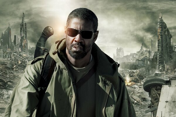 Denzel Washington against the ruins of the city