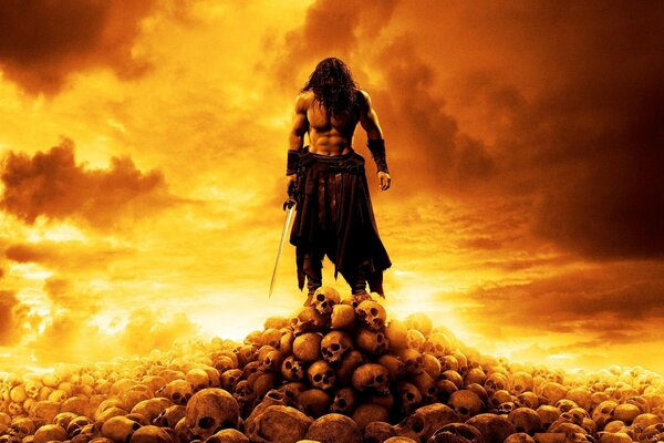 Conan the Barbarian on a mountain of skulls