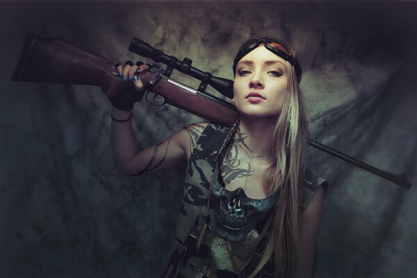 Languid look of a girl with a rifle