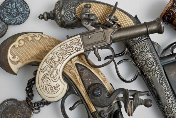 Collection of muskets, carved beautiful work of master gunsmiths