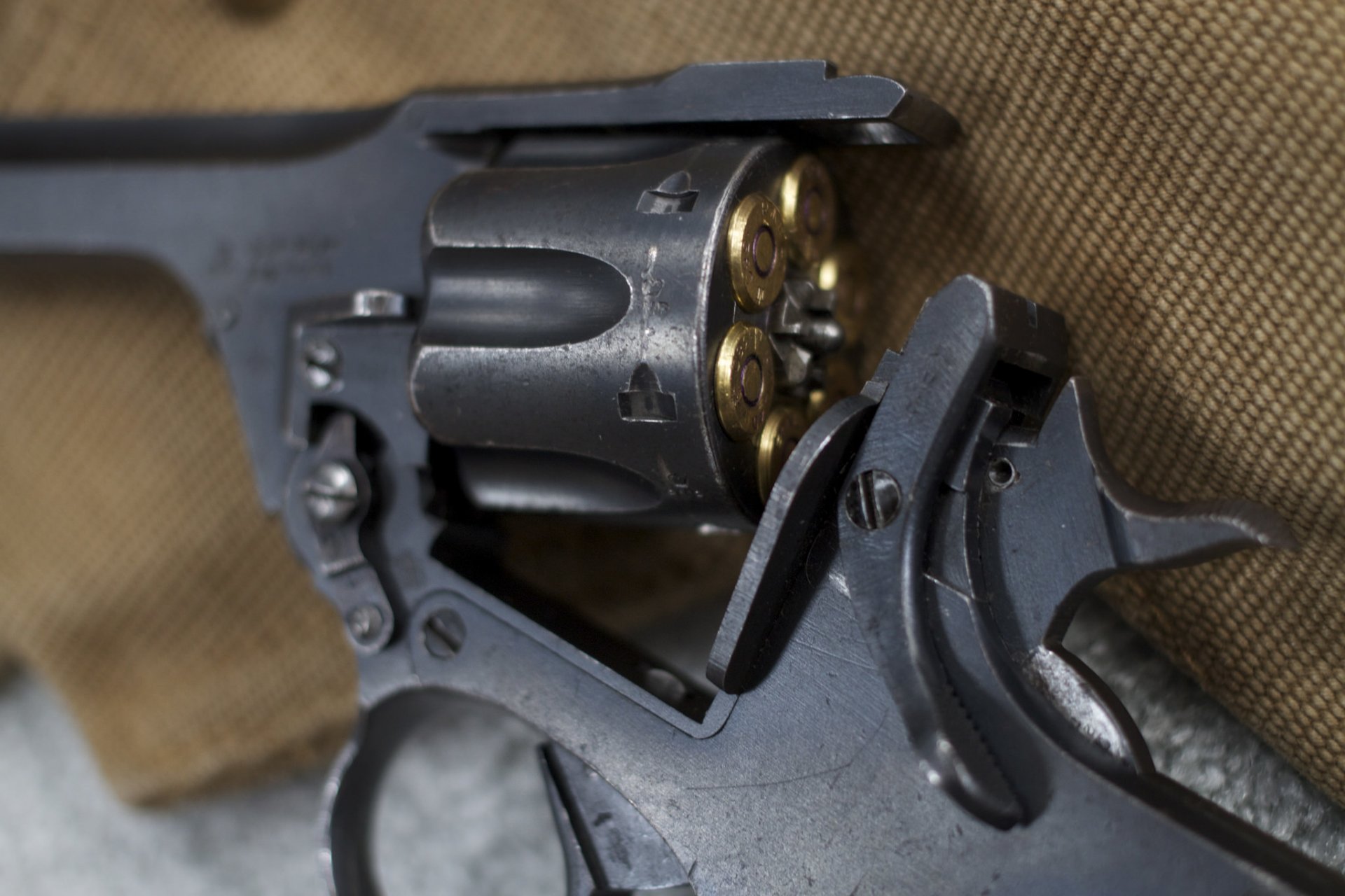 webley&scott revolver weapon close up cartridge