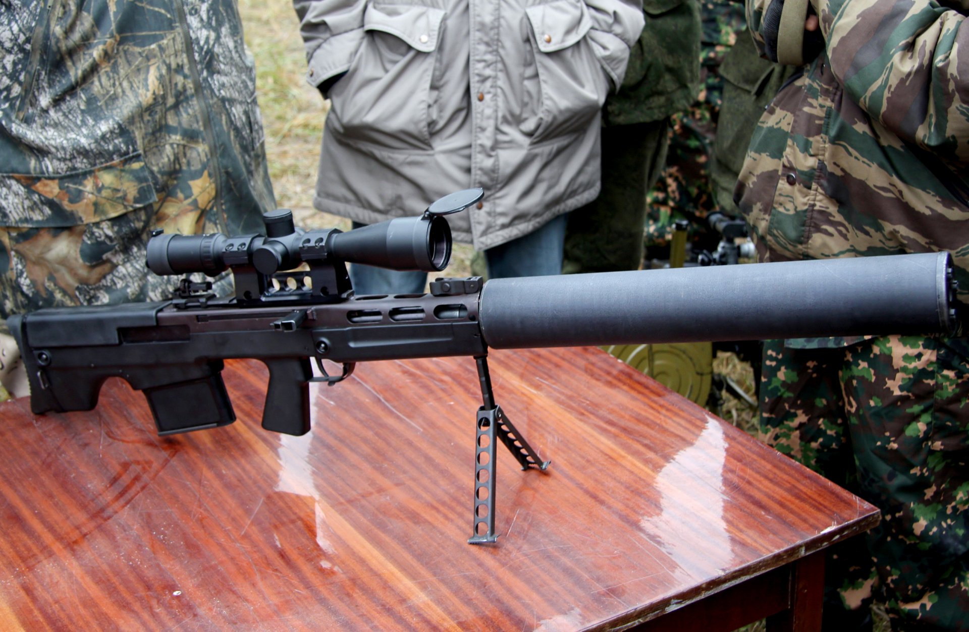 russian silent rifle sniper special large-caliber exhaust made according to layout bullpup development 2002 year cartridge 12.7×55mm sc-130 detachable boxed magazine 5 cartridges weight 5kg length 622mm or 1125mm with silencer longitudinally-sk