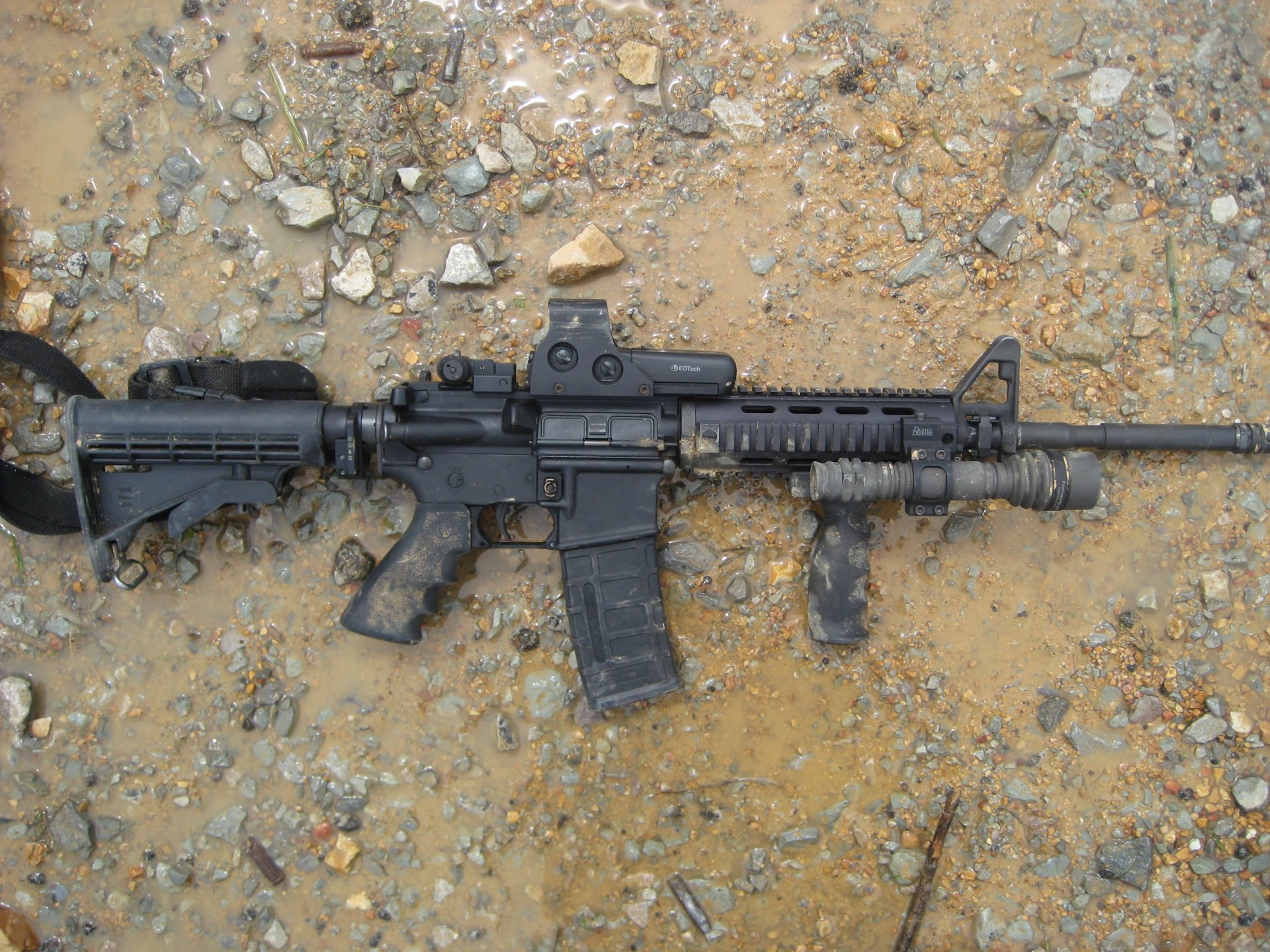 american assault rifle machine solt an ar-15 m16 water stones of the sleeve