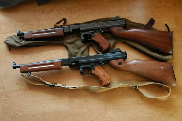 Photo of two m1 Thompsons on the floor